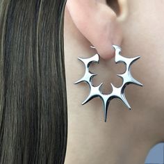 Punk Jewelry With Spikes, Punk Jewelry With Spikes For Alternative Fashion, Gothic Jewelry With Spikes For Alternative Fashion, Edgy Metal Jewelry With Spikes, Edgy Metal Plug Earrings, Trendy Metal Hoop Piercings, Emo Style Pierced Metal Earrings, Edgy Pierced Hoop Earrings As Gift, Edgy Spiked Jewelry For Festivals