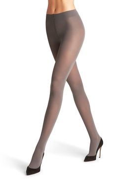 These versatile tights in a flattering matte finish are made with flat seams and a wide waistband for long-lasting comfort. Lined gusset Polyamide/elastane Hand wash cold, dry flat Imported Hosiery Compressive Thigh-high Elastane Tights, Elegant Solid Color Elastane Tights, Compressive Elastane Hosiery, Compressive Solid Elastane Hosiery, Compressive Thigh High Elastane Hosiery, Compressive Thigh-high Elastane Hosiery, Compressive High-cut Leg Elastane Legwear, Micro-elastic Soft Touch Elastane Tights, Compressive Elastane Tights