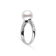 This 9.0-10. mm AAA quality White South Sea pearl ring showcases the pure organic beauty of elegant south sea pearl. The flawless pearl appears to float above the gold, yet is securely attached by a strong post. The classic-style ring features a solid 14-karat gold band that is set with 0.25 carats of diamonds. The ring setting is made in-house and is composed of solid 14 karat gold. We use an extra-fine diamond grade (VS1-G), which is normally reserved for solitaire settings. It's rare to see t White Pearl Ring With Diamond Accents And Akoya Pearl, Formal Pearl Drop Diamond Ring Fine Jewelry, Timeless White Gold Pearl Ring With Diamond Accents, Elegant Pearl Rings In Diamond White, Timeless White Round Cut Pearl Ring, White Timeless Round Cut Pearl Ring, White Akoya Pearl Rings With Diamond Accents, Elegant Diamond White Pearl Rings, Luxury White Rings With Pearl Drop