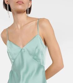 Look to Max Mara for understated elegance such as the Selce maxi dress. Made from lustrous satin in a turquoise hue, the slip design hangs by slim straps and fastens with an invisible zipper at the back..Made in Italy.Material: 29% viscose, 71% acetate.Closure: zipped back, buttoned back.Lining: 10% silk, 85% acetate, 5% polyamide.Care instructions: dry clean.True to size.Cinched waist.Mid-weight material.DT = German size.The model seen in the picture is 178cm-5'10' and wearing a size DT 34 Solid Satin Maxi Dress For Summer, Green Slip Dress With Spaghetti Straps And Bias Cut, Green Bias Cut Slip Dress With Spaghetti Straps, Green Formal Slip Dress For Summer, Solid Satin Summer Dress, Formal Solid Color Summer Slip Dress, Satin Finish Camisole Dress For Evening, Evening Camisole Dress With Satin Finish, Silk Maxi Dress With Spaghetti Straps For Night Out