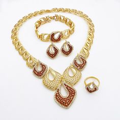 Afraic Jewelry -Dubai Gold Color Jewelry Set Women’s Necklace Earrings Charm Bracelet Nigeria Bride Wedding Party Jewelry product name: latest jewelry set designs for women postage: Free Shipping plating Color: Gold Plated material: alloy keyword: Fine Jewelry Sets For Women Style: TRENDY Shape\pattern: Water Drop Occasion: wedding Model Number: 227 Metals Type: Zinc alloy Material: Metal Jewelry Sets Type: Necklace/Earrings/Ring/Bracelet Item Type: Jewelry Sets Included Additional Item Description: Necklace Earrings Bracelet Ring Gender: Women Model Number:3256804057253874 Product information: Material: alloy Color: Gold Color Product Package Details: 1 Set (Neckace, Bracelet, Earrings,Ring ) Fine Jewelry Sets For Women Hollow Gold Color Necklace Earrings Bracelet Ring Dubai Four Piece In Jewelry Set Design, Wedding Party Jewelry, Latest Jewellery, Shape Patterns, Ring Bracelet, Charm Earrings, Wedding Bride, Metal Jewelry, Types Of Metal