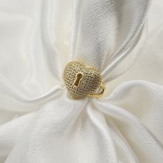 Solid Real 14k Gold  Big Heart Lock Ring. Stunning piece perfect to wear everyday or special occasions. This beautiful ring will give you many compliments. Unique. fancy and modern. 14k gold will not tarnish or rust. This ring has a gold grill in the back to give extra support and a nice 3D effect to the piece. Perfect gift for her. Materials: 14k gold and Cubic Zirconia Heart Dimensions: 18.5x16mm Weight: 4.8 grams 14k stamped  Brand new Fast shipping Briza Collections is a small family owned business that works hard on providing the best selection of Fine Solid Gold Jewelry for the best prices. Our Goal is to bring you happiness and satisfaction, for this reason if you are not satisfied with your purchase we will accept Refunds and exchanges. In order to get a refund let us know within 1 Gold Diamond Ring Stamped 14k For Valentine's Day, Gold Heart-shaped Diamond Ring For Anniversary, Gold Diamond Heart Ring As Gift, Elegant Gold Diamond Ring For Valentine's Day, Valentine's Day Gold Ring With Diamond Accents, Gold Heart-shaped Diamond Ring For Valentine's Day, Gold Heart-shaped Diamond Ring For Gift, Valentine's Day Gold Heart Diamond Ring, Elegant 14k Stamped Heart Ring For Valentine's Day