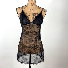 Nwot Victoria’s Secret Black Lace Chemise/Slip Size M Black Lace Lace Up Back Adjustable Straps Measurements Are Approximate: Under Bust Line Side To Side 14” Waist Side To Side 18 From Top Point Of Hemline To Bottom 28.5” Never Worn!! Night Out Camisole Chemise With Built-in Bra, Black Delicate Lace Camisole For Summer, Summer Black Lace Camisole, Fitted Sheer Camisole For Night Out, Sheer Lace Camisole For Daywear, Black Lace Camisole In Flirty Style, Black Lace Camisole In Feminine Style, Fitted Slip With Built-in Bra For Night, Black Lace Coquette Camisole