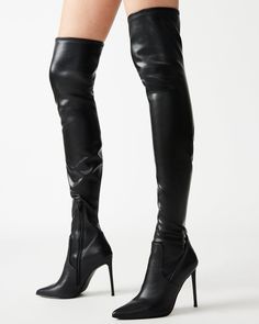 VAVA-voom! A towering stiletto heel, pointed toe and thigh-high shaft make this boot one of the season’s sexiest. Stretch upper to fit most leg sizes Reinforced on top with a silicon strap to ensure no slouching Zipper for ease of getting on and off 4-way stretch patent 4 inch heel height Size 6 measurements: 16.5 inch shaft top circumference, 23.5 inch shaft height Size 8 measurements: 17.25 inch shaft top circumference, 24.5 inch shaft height Size 10 measurements: 18 inch shaft top circumferen Elegant Black Knee-high Boots With High Shaft, Luxury Black High Shaft Heeled Boots, Glamorous Black Ankle-high Boots, Black Knee-high Boots With Sculpted Heel And Pointed Toe, Stiletto Heel Boots, High Black Boots, Black Knee-high Boots With Pointed Toe And Medium Width, Black Paris, Black Thigh High Boots