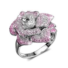 You are sure to feel like royalty in our beautiful new Regal Rose Ring. Each one is set beautifully with a plethora of glistening AAA grade round cut Diamondeau® - the Supreme Diamond Alternative totalling 1.25ct total. This stunning piece features elegant proportions with realistic layered petals rising from your finger. We are delighted to be offering you not one but two options; one in a luxurious gold plate with shimmering white Diamondeau® - the Supreme Diamond Alternative and the other in Gold Watch Men, Diamond Alternatives, Wings Design, Rose Ring, Fire Heart, Men's Necklace, Love Necklace, Mens Jewelry Bracelet, Men Necklace