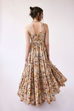 Sleeveless Beige Maxi Dress With Floral Print, Cotton A-line Maxi Dress For Garden Party, Summer Floral Print Cotton Maxi Dress, Beige Cotton Floral Sundress, Sleeveless Cotton Printed Midi Dress, Sleeveless Cotton Midi Dress With Print, Printed Sleeveless Cotton Midi Dress, Printed Cotton Sleeveless Midi Dress, Cotton Maxi Dress For Summer Garden Party