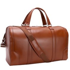 An elegant duffle perfect for a weekend business trip or exotic getaway. Its smooth design and smart style will have you feeling like you’re in command of the skies! Designed to be carried in hand or as a crossbody for ultimate comfort and mobility. Features: Top Grain Cowhide Leather 20.5" x 9" x 12" and 4 lbs. Business organizer Interior slip pocket Tablet pocket Locking double zipper closings Detachable shoulder strap Back zipper pocket Style #8819 Luxury Cognac Briefcase For Travel, Elegant Brown Duffle Bag For On-the-go, Luxury Leather Trim Briefcase For Travel, Luxury Briefcase With Leather Trim For Travel, Luxury Travel Briefcase With Leather Trim, Luxury Cognac Travel Bag, Luxury Travel Bag With Leather Lining, Luxury Luggage With Leather Lining For On-the-go, Classic Cognac Travel Bag For Business Trips