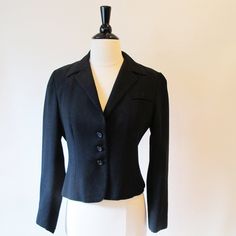 Black Blazer is fitted with a collar and front buttons., fully lined. Lovely style. From the 70's. Measurements with room for comfort Bust- up to 35 1/2 inches Waist- up to 29 inches Exact measurements taken flat to compare to a garment you own Length- 20 inches Sleeve length- 22 1/2 inches Shoulders across the back- 15 inches Bust- 18 1/2 inches Waist- 15 inches Condition- Excellent Dry Cleaned and ready to wear Brand / Designer- no labels to shop for more jackets- https://www.etsy.com/shop/Str Working Girl Office, 1940s Jacket, Girl Office, Black Wool Coat, Office Attire, Wool Dress, Brand Designer, Black Blazer, Wool Jacket