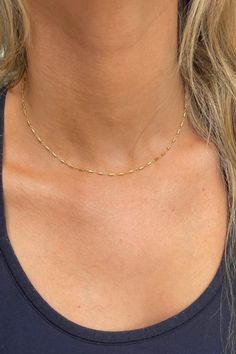 waterproof and dainty 14k gold filled chain with a small spring clasp 16 inches, perfectly lays long or below collarbone Simple Gold Necklace With Paperclip Chain, Simple Gold Paperclip Chain Necklace, Dainty Yellow Gold Choker Charm Necklaces, Dainty Yellow Gold Charm Choker Necklace, Dainty Yellow Gold Choker Charm Necklace, Dainty Yellow Gold Chain Choker, Minimalist 14k Gold Filled Choker, Dainty Yellow Gold Choker For Everyday Wear, Dainty 14k Gold Chain Necklace