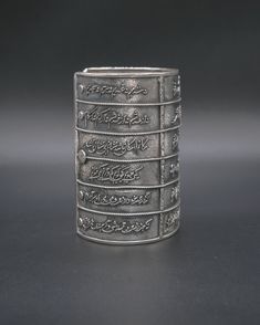 Embrace the beauty of simplicity with our sterling silver cuff that beautifully encapsulates the enchanting words of Rumi's poetry. The hand-carved inscription of "Only Breath" reminds us of the preciousness of each human we encounter. Let this cuff be your daily reminder to pause, breathe, and appreciate the people surrounding you. 190g silver | Length 9 cm by 17 cm Engraved Sterling Silver Cuff Bracelet For Ceremonial Occasions, Sterling Silver Engraved Cuff Bracelet For Ceremonial Wear, Handmade Silver Promise Bracelets, Antique Silver Cuff Bracelet With Oxidized Finish As Gift, Spiritual Sterling Silver Bracelet For Weddings, Spiritual Sterling Silver Cuff Bracelet For Ceremonial Occasions, Spiritual Engraved Sterling Silver Bracelet For Gifts, Unique Engraved Cuff Bracelet As Gift, Handmade Silver Bracelets For Blessing