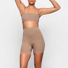 A mid-thigh short with deep low back that makes it perfect backless shapewear option for low cut clothing. Smooths and sculpts thighs and hips with silky smooth compression. | SKIMS Low Back Short | Medium Neutral | Sheer Sculpt Backless Shapewear, Mid Thigh Shorts, Low Back Dresses, Low Cut Dresses, Cut Clothes, Cami Bodysuit, Square Neck Bodysuit, High Waisted Briefs, Back Wedding Dress