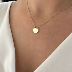 14K Gold Heart Necklace, Minimalist Love Necklace, Wedding Gift The heart shape is universally recognized as a symbol of love and affection. Wearing heart jewelry can indicate a romantic relationship, deep emotional connection, or a loving sentiment toward someone as well as self-love and self-care. Heart jewelry, especially when given as a gift, can symbolize a commitment to a romantic partner or a pledge of loyalty and devotion. It might also represent the idea of giving one's heart to another Pledge Of Loyalty, Relationship Necklaces, Minimal Gold Jewelry, Gold Dainty Necklace, Romantic Partner, Minimal Gold, Romantic Relationship, Heart Shaped Jewelry, Turtle Necklace