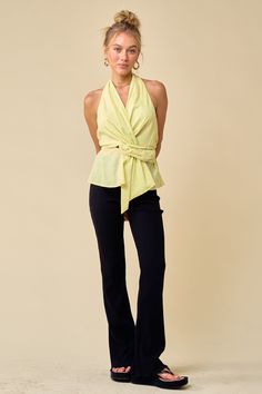 Add some fresh hues to your look for the new season with this halter top. Featuring a yellow floral linen material with twist details and a halter neck, it's perfect. Pair with white jeans and heels for an easy elevated look. Versatile Halter Top For Spring Beach, Versatile Halter Top For Spring Beach Outing, Versatile Halter Top For Beach In Spring, Chic Linen Halter Top, Chic Linen Halter Neck Top, Chic Spring Halter Top For Day Out, Versatile Halter Top For Spring, Yellow Halter Top For Spring Vacation, Chic Stretch Halter Top For Spring