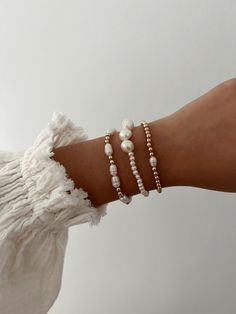 6.5 inch bracelet that stretches Made with freshwater pearls & 14k gold-filled beads Pearl Stretch Bracelet, Pearl And Gold Bead Bracelet, Coastal Beaded Bracelets, Gold Filled Bracelets, Pearl Bracelets Ideas, Pearl And Gold Bracelet, How To Stack Bracelets, Pearl Bracelet Ideas, Diy Pearl Bracelet