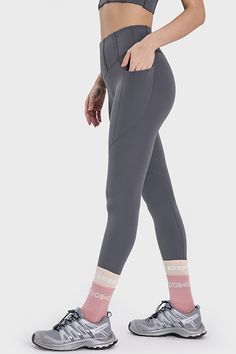 Maximize your workouts with our Pocketed High Waist Active Leggings. Made with high quality fabric, these leggings provide a comfortable and supportive fit. The high waist design offers a flattering silhouette while the pockets provide convenience. Perfect for any active lifestyle. Features: Basic style Stretch: Moderate stretch Material composition: 80% nylon, 20% spandex Care instructions: Machine wash cold. Tumble dry low. Imported Size Bottom Length Waist HIP 4 33.1 22.4 28 6 33.9 24 29.5 8 Breathable Full-length Athleisure Tights, Breathable High Stretch Functional Leggings, High Stretch Breathable Functional Leggings, Gray High Stretch Go-dry Activewear, Functional High Stretch Breathable Leggings, Breathable Compressive Full-length Yoga Pants, High Stretch Athleisure Yoga Pants For Running, Athletic Fit Leggings With Light Support, Breathable High Stretch Activewear Long Pants