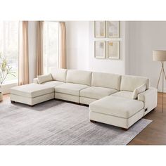 a living room with a large sectional couch