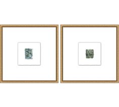 two framed pictures on a white wall