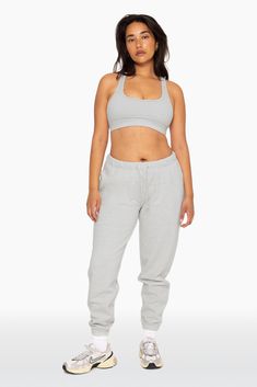 Stay cozy in our Drawstring Sweatpants in Heather Grey. Boasting a high rise, encased elastic waist and ankle bands, and an embroidered SET logo on the upper right thigh, these sweatpants combine comfort with sophistication. Crafted from our heavyweight sweats fabric, they ensure maximum coziness. Gray Athleisure Sweats For Loungewear, Gray Sportswear Sweats For Loungewear, Gray Sweats For Loungewear Sportswear, Sportswear Sweats With Elastic Waistband For Lounging, Gray Sweatpants With Ribbed Cuffs For Loungewear, Gray Activewear With Ribbed Cuffs For Loungewear, Gray Joggers For Loungewear, Gray Athleisure Joggers For Loungewear, Gray Activewear For Loungewear