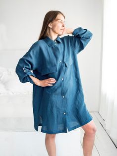 Relaxed fit oversized women's linen shirt dress LONGI in Lake Blue. Straight cut, long sleeves and two front patch pockets with flaps create an elegant look. Made from natural 100% linen, it is perfect for work or casual summer evenings. One size that fits all: XS, S, M, L, XL The model is 5′8″ (177cm) tall GARMENT SIZING - Bust: 51″ / 130 cm - Waist: 52.5″ / 134 cm - Hem: 54″ / 138 cm - Back length: 37.5″ / 95 cm - Front length: 33.5″ / 85 cm - Sleeve from the neckline: 24.5″ / 62 cm - Armhole: 5.5″ / 14 cm DETAILS ✓ 100% linen fabric ✓ Oversized fit ✓ 2 front pockets with flaps ✓ Long sleeve or 3/4 sleeve (adjust with 2 buttons) ✓ Button-up fastening at the front ✓ Made from 100% linen ✓ Available in multiple colors ✓ Medium weight linen approx. 160 GSM ✓ Pre-washed for maximum softness Oversized Blue Shirt Dress For Summer, Oversized Long Sleeve Shirt Dress For Summer, Oversized Linen Shirt Dress For Summer, Relaxed Fit Linen Button-up Shirt Dress, Casual Oversized Linen Dress With Pockets, Oversized Long Sleeve Linen Dress For Beach, Flax Linen Long Sleeve Dress With Relaxed Fit, Fall Linen Relaxed Fit Shirt Dress, Oversized Blue Linen Dress