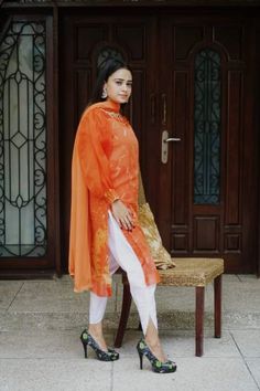 Tulip Shalwar Kameez, Color orange + White. A short light volume stuff. 3D flowers and Organza sleeves. Designer Orange Salwar Kameez, Spring Orange Straight Kurta, Orange Semi-stitched Kurta With Sheer Dupatta, Orange Georgette Kurta With Dupatta, Orange Sets With Resham Embroidery For Spring, Orange Resham Embroidery Sets For Spring, Spring Orange Sets With Resham Embroidery, Spring Orange Resham Embroidery Sets, Orange Bollywood Style Georgette Kurta