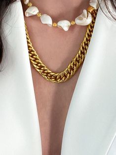 Gold gourmet chain necklace made of steel. This is a statement necklace suitable for a minimalist look or as a base necklace for layering. Dimensions: 50 cm / 20in You can add an extender chain of 5cm / 2in (Choose in the dropdown menu) Nickel Free DELIVERY (estimate delays) Greece: 2-5 business days via ELTA Europe: 5-10 business days via Hellenic Post International: 10-21 business days via Hellenic Post You can shorten considerably your delivery times by upgrading to DHL Express services at checkout. All Pure Greek Jewelry are inspired from the current trends, classical arts, world traditions and cultures. Our jewelry are handmade with love and imagination so you can enjoy unique creations. We use mineral and semi-precious stones, freshwater pearls, crystals, steel chains and gold plated White Double Chain Necklace Gift, White Cuban Link Necklaces With Gold Chain, White Curb Chain Link Necklaces, White Cuban Link Chain Necklace With Adjustable Chain, Everyday White Double Chain Necklace, Metal Pearl Chain Link Necklace, White Chunky Link Chain Necklaces, Minimalist Metal Pearl Chain Necklace, Everyday White Chunky Chain Necklace