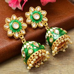 Fancy Party Wear Traditional Earrings. Perfect with ethnic & traditional wear. Perfect gift for any occasion for yourself and your dear ones. It is advisable to store jewellery in a zip lock pouch (air tight pouch), keep away from water perfume and other chemicals and clean it with dry and soft cloth. Green Jhumka, Earring Indian, Party Wear Traditional, Earring Bridal, Traditional Earrings, Bollywood Jewelry, Kundan Earrings, Statement Earring, Fancy Party