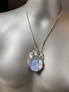 "Artisan Rainbow Druzy pendant comes with 20\" silver chain Hand-made Sterling Silver 925. Stones used: Rainbow Druzy, Pink Tourmaline. Height -2 1/2\" (including bail), Width - 1 3/4\" Height - 65mm (including bail), Width - 45mm Unique Handcrafted One-of a-kind Design Pendant Each Piece of Jewelry in my Collection is Absolutely One of a Kind! When you start wearing a piece of my jewelry you will fall in love with it more and more each day and feel that good Energy and Love that I pass into it Sterling Silver Large Round Pendant Jewelry, Unique Sterling Silver Necklace For Gift, Unique Sterling Silver Necklace As Gift, Artistic Sterling Silver Necklaces, Nickel Free, Silver Flower Pendant Necklace With Soldered Detail, Artistic Sterling Silver Nickel-free Necklace, Artistic Sterling Silver Necklace Nickel Free, Artisan Sterling Silver Round Pendant Jewelry, Handmade Artisan Sterling Silver Necklace