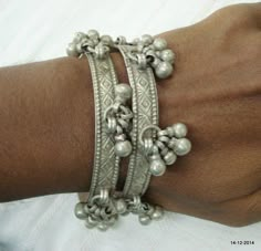 Vintage Antique ethnic collectible very nice tribal old silver Bracelet / bangle set 2pc from rajasthan India. Worn by Banjara tribal people of Rajasthan. Beautiful workmanship all over the piece, adorn with silver bells. Good for your jewellery collection.Inner diameter  - 6.5 cm(2.55")Inner circumference -20.4 cm (8")width - 1 cm(0.4")weight for set - 107 gramsmaterial - silver and original old worn piece. Gold Silver Jewelry Mix Jewellery Antique, Luxury Spiritual Antique Silver Jewelry, Luxury Antique Silver Antique Jewelry, Luxury Bohemian Antique Silver Jewelry, Handmade Silver Jewelry Antique, Hammered Silver Jewelry Antique, Antique Ethnic Jewelry, Cheap Antique Silver Jewelry For Women, Luxury Antique Silver Spiritual Jewelry