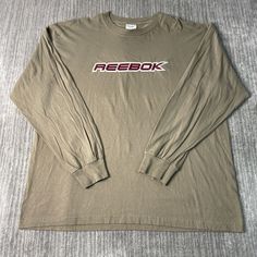 Vintage 2000s Reebok Spell Out Basic Essential Streetwear Y2K Aesthetic Sportswear Athletic Green Graphic Long Sleeve Shirt Extra Large Mens Condition:  Excellent Used Condition  = No Flaws Measurements: Please see photos above for all measurements IF YOU BUY TWO OR MORE ITEMS USE THE CODE BUNDLE @ CHECK TO SAVE 20% WE SHIP WITHIN 24 HOURS AFTER PURCHASE! Please be aware that we do not offer free returns!! The Buyer is responsible for the cost of the return label.  Follow us on TikTok & Instagra Long Sleeve Activewear With Logo Print For Streetwear, Sporty Long Sleeve Activewear With Logo For Streetwear, Casual Long Sleeve Activewear With Logo Print, Athletic Greens, Graphic Long Sleeve Shirts, Streetwear Y2k, Vintage 2000s, Y2k Aesthetic, Graphic Long Sleeve