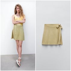 High-Waisted Mini Skirt. Side Wrap Closure With Self Tide. Beige Fitted Mini Wrap Skirt, Zara Casual Stretch Skirt, Casual Mini Wrap Skirt For Day Out, Casual Fitted Wrap Skirt For Day Out, Casual Relaxed Mini Wrap Skirt, Beige Mini Wrap Skirt For Spring, Beige Flowy Wrap Skirt, Casual, Spring Beige Mini Wrap Skirt, Casual Flowy Wrap Skirt For Fall