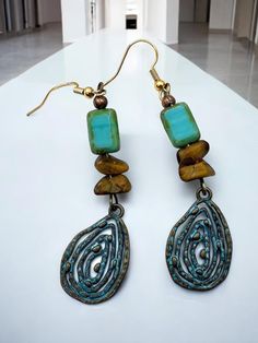 Gorgeous patina and Czech glass pair of dangly earrings 3" long Tear drop shape Bronze Czech Glass Dangle Jewelry, Bronze Czech Glass Drop Earrings, Pierced Teardrop Metal Beaded Earrings, Pierced Teardrop Beaded Earrings, Metal Long Drop Earrings With Dangling Beads, Unique Metal Beaded Dangle Earrings, Bronze Dangle Chandelier Earrings, Artisan Metal Chandelier Earrings With Dangle Shape, Handmade Metal Dangle Linear Earrings