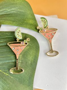 These adorable Margarita Earrings will add a playful touch to any outfit. The hypoallergenic design ensures comfort for all-day wear. Dazzle everyone at your next party with these bomb earrings. Perfect for the warm weather ahead. Height 2.2 in Width 1.2 in Multicolor Zinc Alloy Margarita Earrings, Accessories Necklace, Warm Weather, Zinc Alloy, Bag Accessories, Gifts, How To Wear, Quick Saves, Design