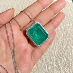 Emerald Doublet Necklace features semi precious green stone and cz diamonds in rectangle shape. Ideal to pair with your design outfits and bridal wedding gown. These LUXURY Statement Green Pariba Tourmaline necklace surely elevate your look. Perfect Gift For her. *𝐏𝐑𝐎𝐃𝐔𝐂𝐓 𝐃𝐄𝐓𝐀𝐈𝐋* * 𝐌𝐚𝐭𝐞𝐫𝐢𝐚𝐥: Brass * 𝐏𝐥𝐚𝐭𝐢𝐧𝐠: White Rhodium Plated * 𝐒𝐭𝐨𝐧𝐞: AAA-quality CZ Diamond & Doublet. *𝐃𝐈𝐌𝐄𝐍𝐒𝐈𝐎𝐍𝐒* *𝐍𝐞𝐜𝐤𝐥𝐚𝐜𝐞* * 𝐖𝐞𝐢𝐠𝐡𝐭: 12 gm  * 𝐋𝐞𝐧𝐠𝐭𝐡: 17 Inches * Luxury Tsavorite Necklaces, Exquisite Emerald Diamond Necklace, Exquisite Emerald Cut Diamond Necklace, Diamond Emerald Pendant Necklace, Formal Emerald Cut Cubic Zirconia Necklace, May Birthstone Jewelry With Emerald Cut Gemstone Accents, Emerald Cut Gemstone Jewelry For May Birthstone, Green Diamond Necklace With Jewels, Anniversary Emerald Necklace With Cubic Zirconia Jewels