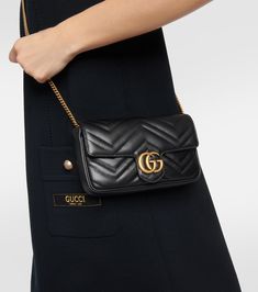 GG Marmont leather wallet on chain in black - Gucci | Mytheresa Gucci Luxury Wallet On Chain With Chain Strap, Classic Gucci Wallet On Chain, Classic Gucci Leather Wallet On Chain, Gucci Leather Wallet On Chain For Formal Use, Gucci Leather Wallet On Chain For Formal Occasions, Gucci Evening Wallet On Chain With Chain Strap, Classic Gucci Wallet On Chain For Evening, Gucci Wallet On Chain With Chain Strap For Evening, Gucci Wallet On Chain For Evening With Chain Strap