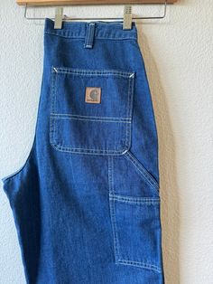 Vintage Carpenter Workwear Denim Carhartt Workwear  Amazing!  Nice Blue with White stitching  100% cotton Large pockets Size on tag 30x30 Waist 15" Rise 12" Inseam 31" Length 41" Thank you for visiting :) **PLEASE NOTE** vintage items are pre-owned and not new.  ~all items are final sale if you're in doubt, please ask for measurements or information. although i try to reflect colors accurately, there may be slight differences in their appearance on screen and/or in person. all garments are pre-o Carhartt Carpenter, Carhartt Workwear, Womens Jeans, Vintage Shop, I Try, Vintage Finds, Vintage Shops, Work Wear, Ready To Wear