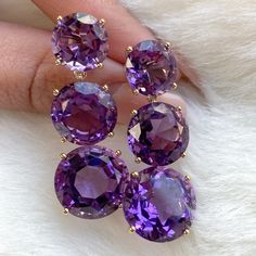 3 Tier Round Faceted Amethyst Earrings – Goshwara Luxury Round Amethyst Gemstones, Luxury Amethyst Earrings For Formal Occasions, Luxury Purple Round Earrings, Luxury Gold Amethyst Earrings, Luxury 14k Gold Purple Jewelry, Luxury Purple 14k Gold Jewelry, Luxury Purple Round Jewelry, Luxury Amethyst Earrings With Gemstone Accents, Round Purple Earrings With Gemstone Accents