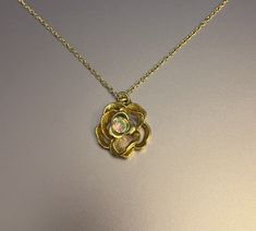 Gold Rose with Rhine Stone Center - 16 Inch Gold Necklace with a Gold Rose with Rhine Stone Center Pendant - Jewelry Amity Necklace, Jessie Prescott, Print Gifts, Gold Rose, Pendant Jewelry, Favorite Jewelry, Fashion Designer, Jewelry Necklace Pendant, Aurora