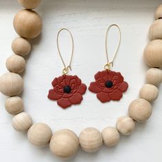 Handmade polymer clay earrings Clay flower dangle earrings Clay poppy flower earrings Handmade poppy floral clay earrings. These clay poppy earrings are created from high quality clay and are nickel free. These earrings are super lightweight! They also make the perfect boho statement earrings! * Nickel Free * Super Lightweight * Each pair of earrings is handmade and uniquely designed! No two are alike! CARE INSTRUCTIONS: Handle earrings with care. Polymer clay is flexible and durable, but can br Adjustable Polymer Clay Earrings With 3d Flowers, Adjustable Polymer Clay Flower Earrings, Flower-shaped Polymer Clay Earrings With Ear Wire, Flower Shaped Polymer Clay Earrings With Ear Wire, Everyday Polymer Clay Dangle Flower Earrings, Everyday Dangle Polymer Clay Flower Earrings, Dangle Earrings With Flower Charm In Polymer Clay, Everyday Dangle Flower Earrings In Polymer Clay, Nickel-free Flower-shaped Polymer Clay Earrings