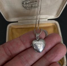 70s VINTAGE SILVER Locket and 16 inch Chain, Sterling Silver Engraved Pendant Necklace, Vintage Silver Jewelry, Heart Vintage Locket offered by Isobel Vintage Jewels on Etsy Style: Vintage 1970s real silver locket. A lovely heart shaped 70s side opening sterling silver locket big enough for putting little photos inside. You can add engraving to it as there is a space on the front for a name to be engraved! Colour: silver  Size: 2 x 2 cm and 16 inch chain Condition: Excellent condition Approximat Art Nouveau Locket, Vintage Heart Locket, Vintage Locket, Pendant Necklace Vintage, Vintage Silver Jewelry, Heart Vintage, Sterling Silver Locket, Engraved Pendant, Silver Locket