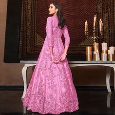 This pink colored anarkali suit is beautifully adorned with zari embroidered and sequins work as shown. This net anarkali suit comes along with semi stitched satin bottom, lining and net dupatta which makes it appear more adorning. Women can buy this suit to wear for their party, sangeet, homely events and ideal for any fashionista. Note:- The actual product may differ slightly in color and design from the one illustrated in the images when compared with computer or mobile screen. Size Chart Size: Semi Stitched/Unstitched can be altered from maximum to minimum size based on size chart Pink Churidar With Dabka Work For Reception, Pink Dabka Work Churidar For Reception, Elegant Pink Churidar For Reception, Pink Long Sleeve Anarkali Set For Reception, Pink Resham Embroidery Churidar Maxi Length, Pink Resham Embroidery Maxi Churidar, Pink Resham Embroidery Maxi-length Churidar, Pink Anarkali Set For Reception, Pink Zari Work Churidar For Reception