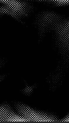 an abstract black and white background with dots