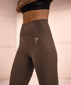 DO IT ALL IN VITAL From work to workout, you need your essentials to be able to do it all alongside you, which is why Vital’s sweat-wicking tech and seamless design is gonna tick all your boxes. • Supportive ribbed waistband• Sweat-wicking tech keeps you dry however you move• Breathable mesh dots keep you cool• Physique-shaping shades• Seamless design for comfort & confidence SIZE & FIT• High-waisted fit- Model 1 is 5'9" and wears a size S- Model 2 is 5'7" and wears a size S​- Model 3 i… Gymshark Vital Seamless Leggings, Cute Workout Sets, Sport Vibes, Athletic Dresses, Model Training, New Neutrals, Gymshark Vital Seamless, Gymshark Leggings, Neutral Colours