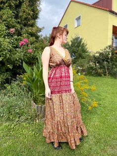 Our summer boho maxi dress is made of silk blend with beautiful floral print. It is a perfect attire for summer evenings and days. The skirt is wide and made from 5 parts stitched together with a decorative stitching. It is made with a natural 70% silk fabric in perfect hippie boho chic style. A perfect attire for a real flower child! The best choice to impress, you'll look divinely beautiful in this chic boho dress with slightly oriental flare.  SIZE  Chest 102 cm Waist 92 cm The dress is suitable for breast up to EU size 5. Length is 139 cm.  The material is 70% silk, 30% viscose. This piece is handmade in Kashmir. Hippie Floral Print Sleeveless Sundress, Sleeveless Boho Print Dress For Garden Party, Bohemian Sundress With Floral Print, Bohemian Sleeveless Sundress With Floral Print, Hippie Floral Print V-neck Maxi Dress, Bohemian Sleeveless Sundress For Garden Party, Hippie Sleeveless Floral Print Dress, Boho Print Maxi Sundress, Sleeveless Boho Sundress With Floral Print