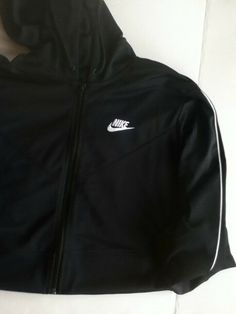 AUTHENTIC NIKE WOMEN  SPORTSWEAR HERITAGE TRACK SUIT DB3880-010 DB3886-010 STANDARD FIT  BODY 100% POLYESTER  RIB 97% COTTON 3%SPANDEX HOOD  LINING 100% POLYESTER Nike Athleisure Track Jacket, Sportswear Track Jacket With Three Stripes Branding, Nike Athleisure Track Jacket For Sports Season, Nike Track Jacket For Sports Season In Athleisure Style, Nike Moisture-wicking Track Jacket, Nike Moisture-wicking Sportswear Track Jacket, Sporty Hooded Track Jacket, Winter Sporty Tracksuit For Gym, Winter Tracksuit For Gym