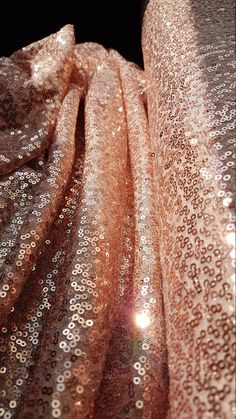 Rosegold fabric with shiny sequins, beautiful sparkling mesh fabric for wedding, engagement or parties, transparent mesh fabric LL-1166 Slightly transparent fabric with beautiful sequins in rosegold for gorgoues dresses. Perfect for dress making, deco and much more. Color: rosegold width sequins: 53 Inch (135cm) width mesh: 59 Inch (150cm) Price is set for 1 yard/91,5 cm. You will receive the fabric in one continuous piece if you purchase more than 1 yard. If you need a different amount, please Glamorous Sequin Fabric For Festive Celebrations, Glamorous Festive Sequin Fabric For Celebration, Gold Sparkling Sequin Dress For Wedding, Metallic Shiny Sequin Fabric For Party, Glamorous Glitter Sequin Fabric For Party Season, Glamorous Festive Contrast Sequin Fabric, Glamorous Sequin Fabric For Prom And Festive Occasions, Glamorous Contrast Sequin Fabric For Wedding, Festive Glamorous Contrast Sequin Fabric