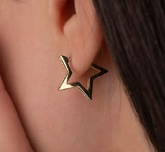 Our star hoop earring is 14k solid gold and its front side is decorated with zircon stones. Our gold star earring has a unique style that will accompany you at any time of the day. This star hoop earring completes your all outfit in a day.  You can make happy your loved ones with our gold star hoop earrings for birthdays, mother's day, valentine's day, anniversaries, or graduations. It will be a perfect and unique gift! The gold hoop earring's height is approx. 17.97 mm. 🎁 If you want you can a Gold Star Hoop Earrings, Star Earrings Hoop, Star Earrings Gold, Star Hoop Earrings, Gold Star Earrings, Star Earring, Unique Earring, Earring Gift, Earring Gold