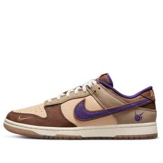 The Nike Dunk Low Premium 'Setsubun' is a stylish sneaker designed for adults. The silhouette features a combination of dark brown, light brown and purple, with the Swooshes, lining, tongue and outer heel embroidered with the word “Devil” in purple for contrast. The semi-transparent outsole features a white midsole with a space art piece from the late Edo period (1840s) by Utagawa Kuniyoshi. This sneaker is perfect for everyday wear, and its unique design will make you stand out from the crowd. The inspiration behind the design comes from the Setsubun festival, making this sneaker a must-have for anyone looking to add a touch of style to their wardrobe. (SNKR/Retro/Skate/Casual) Sporty Brown Basketball Shoes With Contrast Sole, Brown Skate Shoes With Contrast Sole For Streetwear, Nike Brown Basketball Shoes For Streetwear, Brown Low-top Basketball Shoes With Rubber Sole, Brown Basketball Shoes With Contrast Sole For Streetwear, Brown Sporty Basketball Shoes With Gum Sole, Sporty Brown Basketball Shoes With Gum Sole, Sporty Brown Skate Shoes With Rubber Sole, Nike Brown Basketball Shoes With Rubber Sole