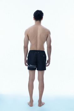 SUSTAINABLE GARMENT for the better future. Our swimshorts are now in recycled fabric. Water repellent and quick dry fabric perfect for swimming or gym. Available in black gold accent, black gunmetal accent and many more colors. This product helps end plastic waste. High quality metal tip color contrast drawstring Side pockets and back pocket Eyelets on the back Printed design Built in mesh underwear 100% RECYCLED POLYESTERmesh:100% POLYESTERFabric is imported from South KoreaDELICATE MACHINE WAS Black Swim Trunks With Built-in Shorts For Beachwear, Black Beachwear Swimwear With Drawstring, Black Swimwear With Functional Drawstring For Summer, Summer Black Swimwear With Functional Drawstring, Black Beachwear Swimwear With Functional Drawstring, Black Swim Trunks With Pockets For Poolside, Black Short Length Swim Trunks For Beachwear, Black Beachwear Swim Trunks Short Length, Black Swim Trunks With Pockets