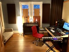 there is a music studio with many electronic equipment