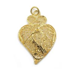 Features The Viana's Heart was created as a symbol of devotion to the Most Sacred Heart of Jesus, but soon became an iconical and emotional heritage of Portugal and of the Portuguese art of filigree. Filigree imitation gold pendent, lacy, to be worn with the Traditional Women's costumes To Clean Do Not Use Abrasive Products; Gold in Color, Not Real Gold Used By The Traditional Portuguese Women Folklore Dancers Measurements: 2" x 1.25" Inch Manufacturing Process Portuguese filigree is the result Valentine's Day Yellow Gold Jewelry With Intricate Design, Traditional Heart-shaped Jewelry For Festive Occasions, Traditional Heart-shaped Yellow Gold Jewelry, Heart-shaped Yellow Gold Jewelry With Intricate Design, Heart Shaped Yellow Gold Jewelry With Intricate Design, Valentine's Day Gold Necklace With Intricate Design, Traditional Heart Pendant Jewelry For Wedding, Traditional Gold Heart-shaped Jewelry, Traditional Gold Heart Jewelry